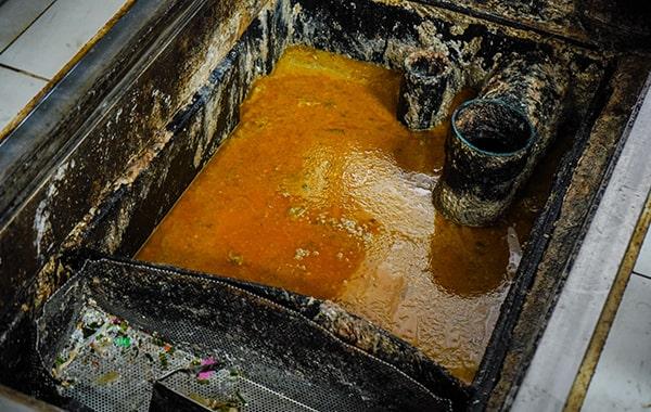 grease trap cleaning helps prevent grease and oil from entering the drain system, hence reducing the risk of environmental contamination